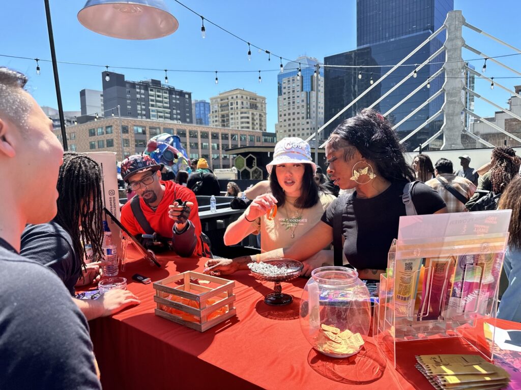 Budtenders explore the Sunset Connect booth at their brunch. (David Downs)